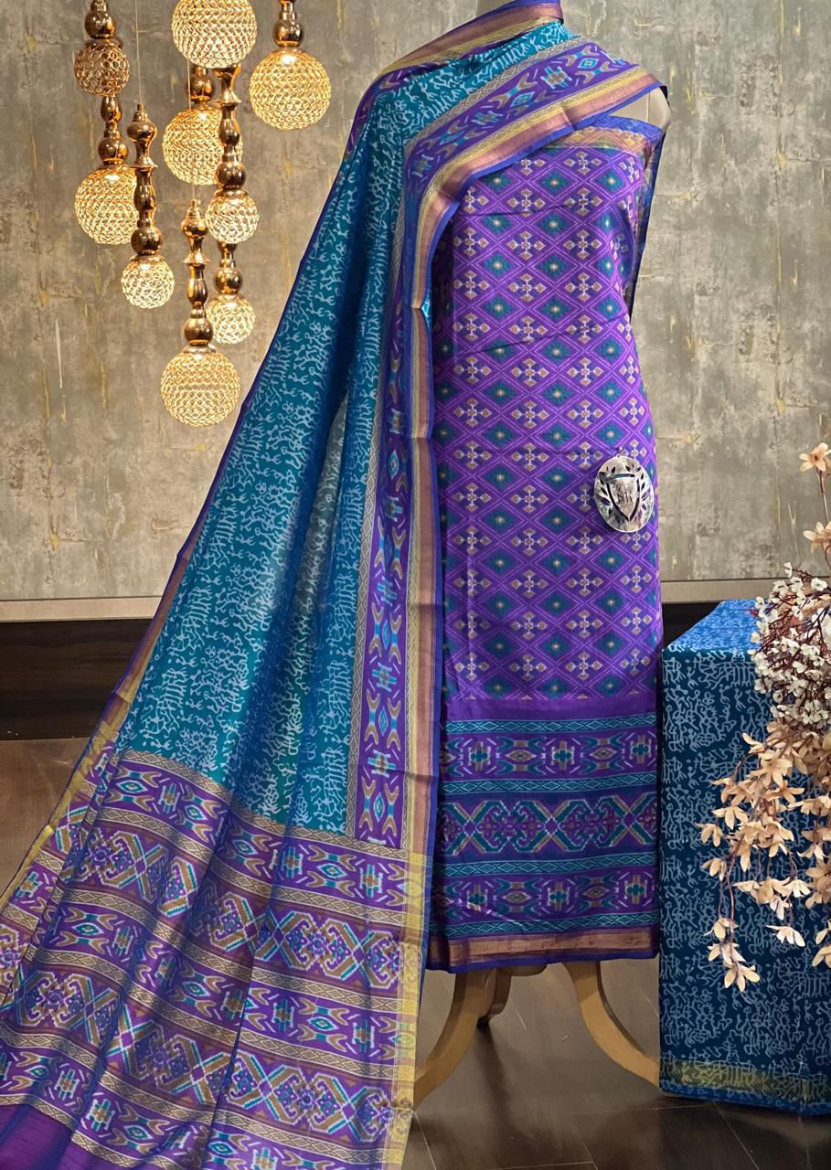 Exquisite Patola Printed Silk Unstitched Suit Set with Zari Border