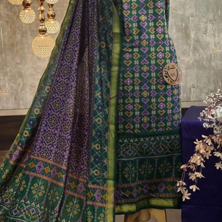 Elegant Green Patola Printed Silk Suit with Zari Border & Purple Dupatta
